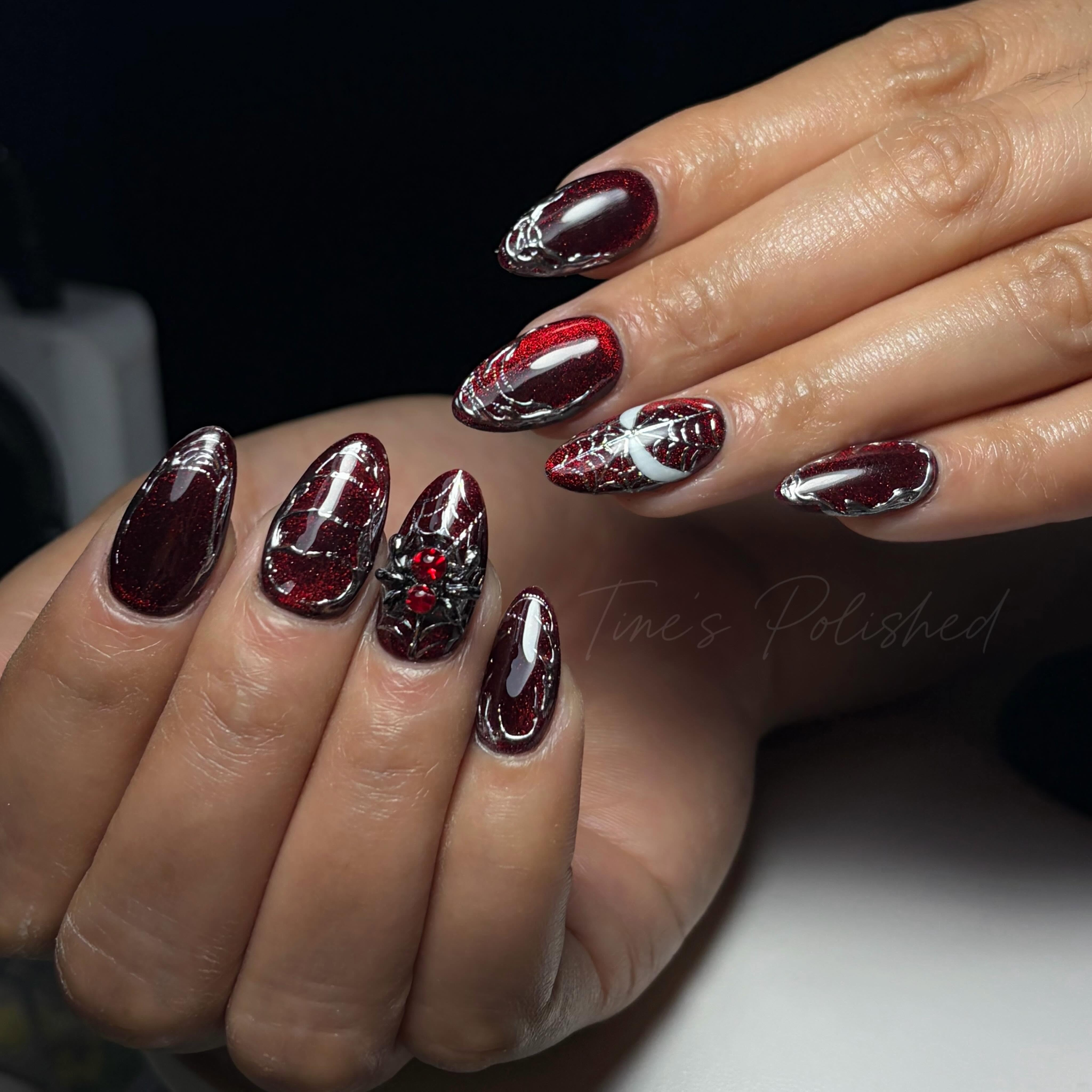 Dark red glitter nail art